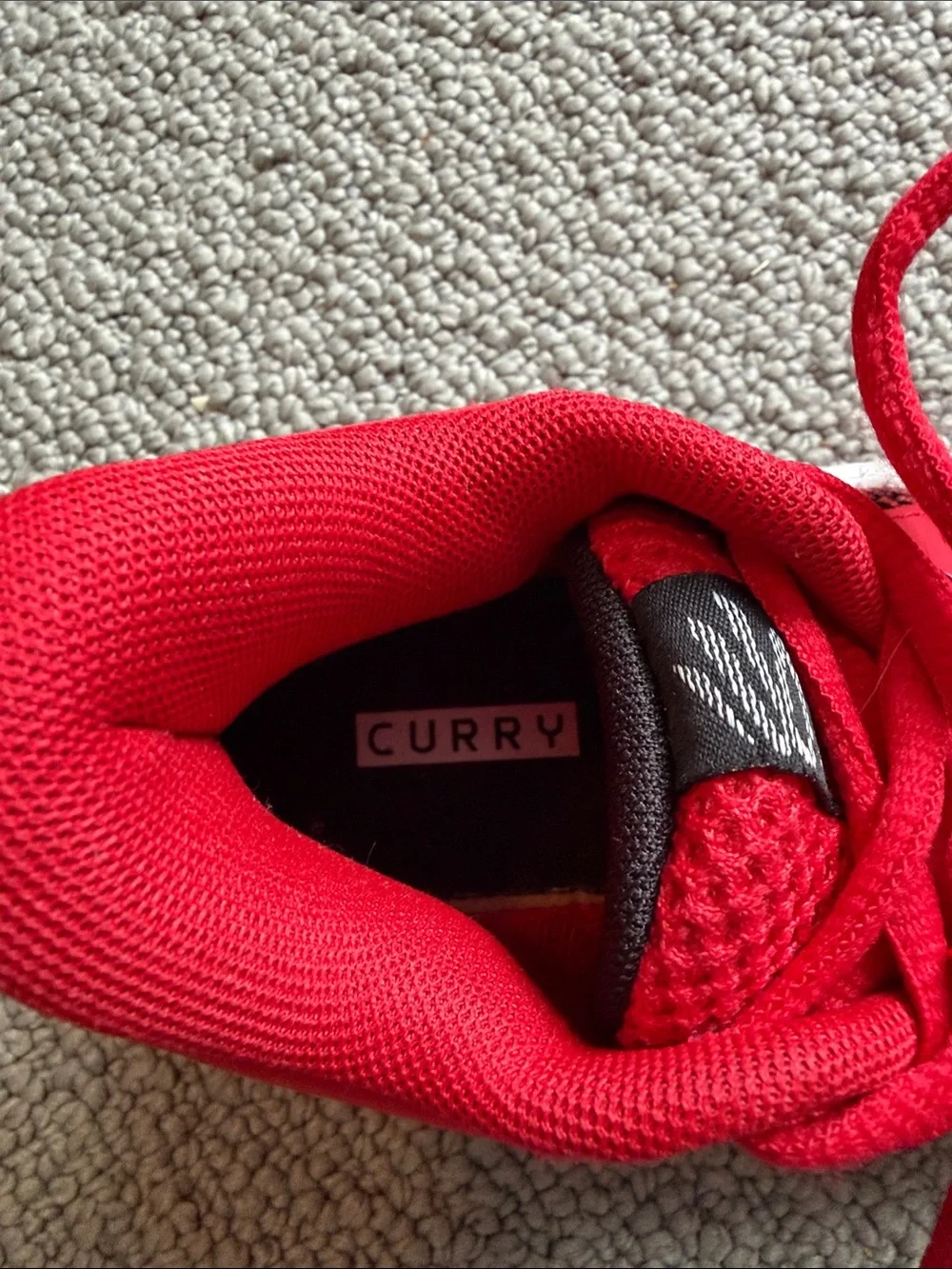 Under Armour Steph Curry Kids Red and Black Basketball-Style Sneakers